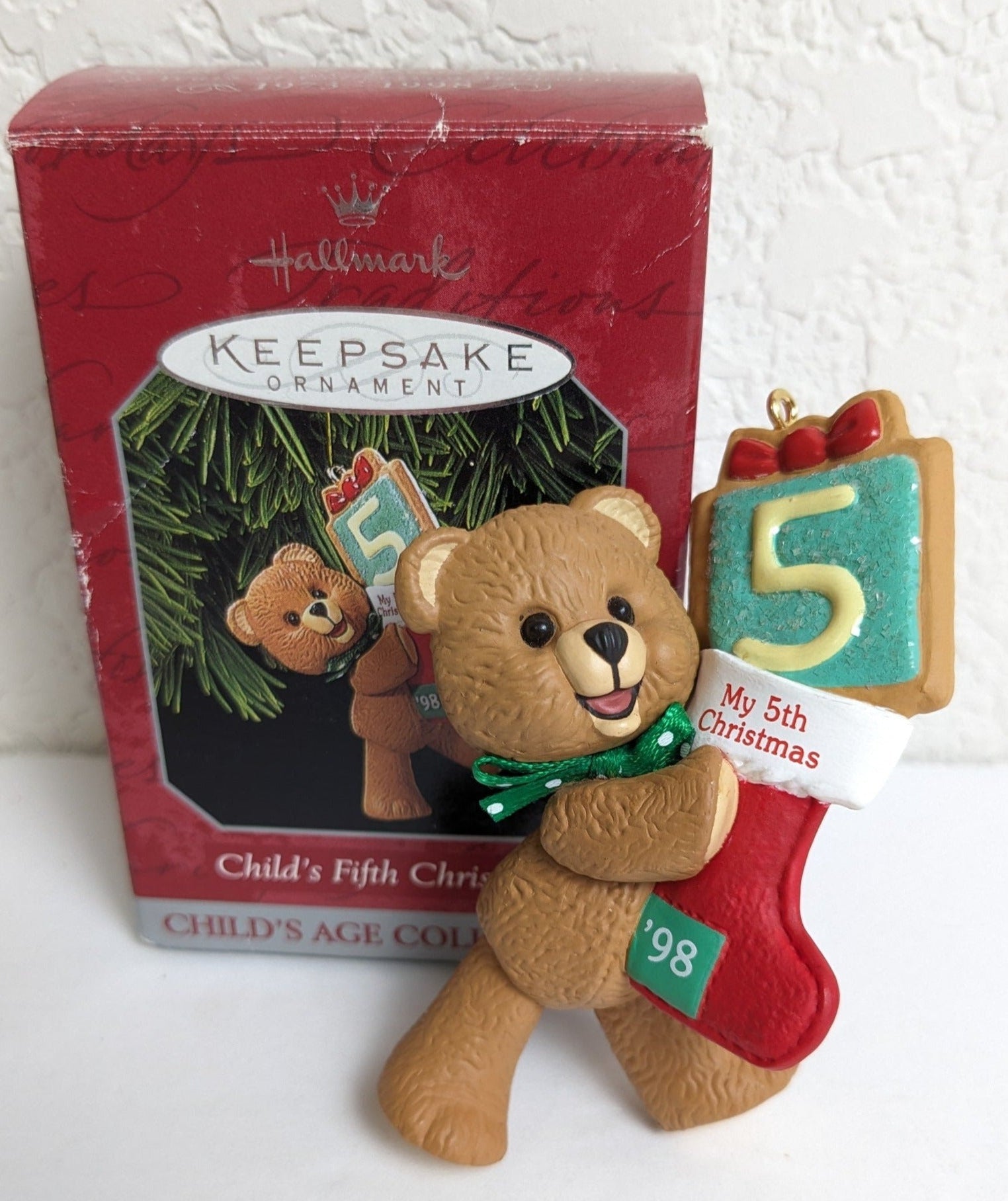 Hallmark Keepsake ornament celebrating a child's 5th Christmas with the year '98 on the stocking, this precious teddy bear makes a great stocking stuffer!
