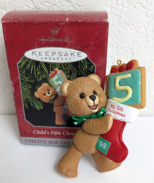 Hallmark Keepsake ornament celebrating a child's 5th Christmas with the year '98 on the stocking, this precious teddy bear makes a great stocking stuffer!