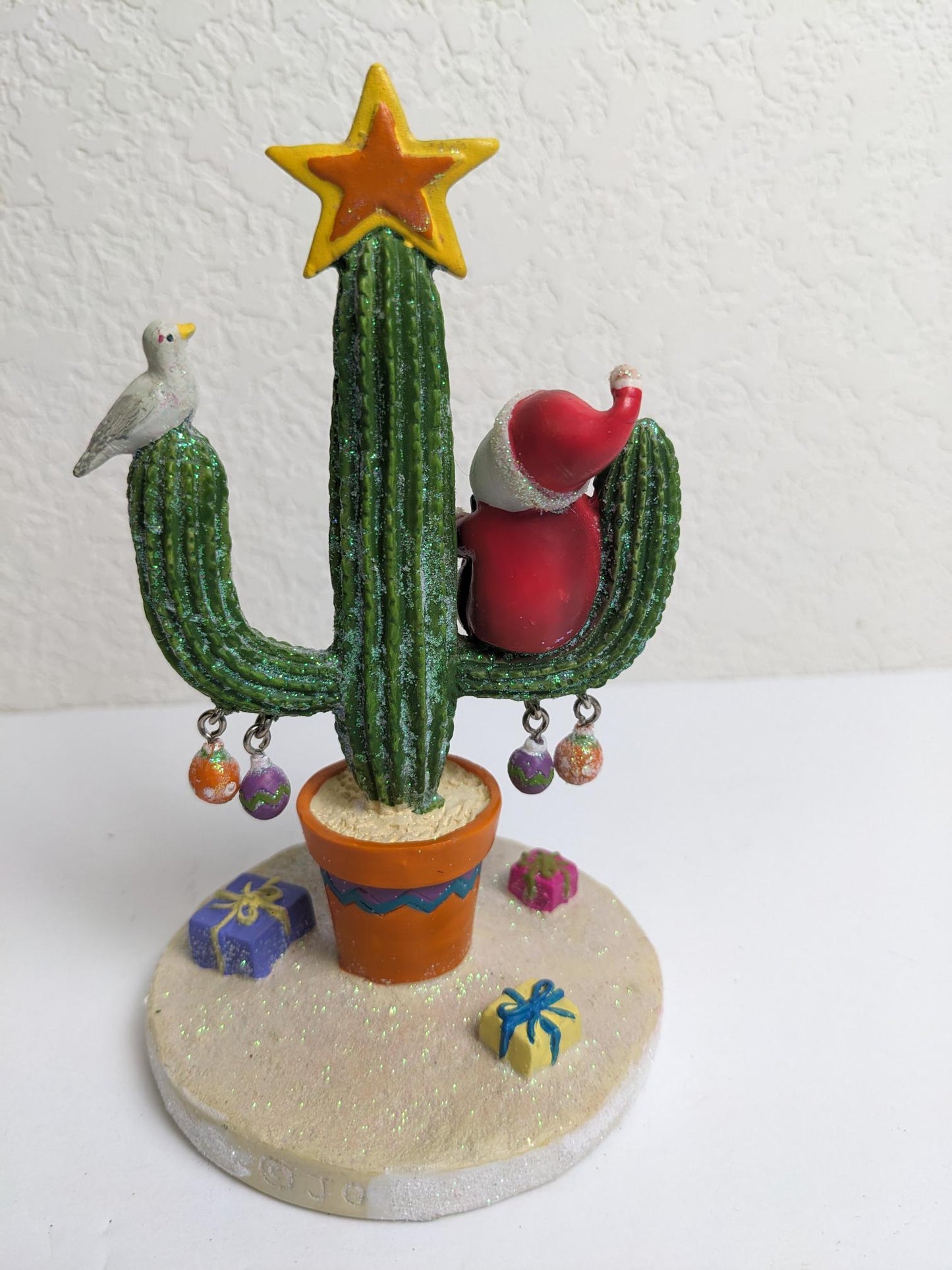 Santa on Cactus Christmas Figurine