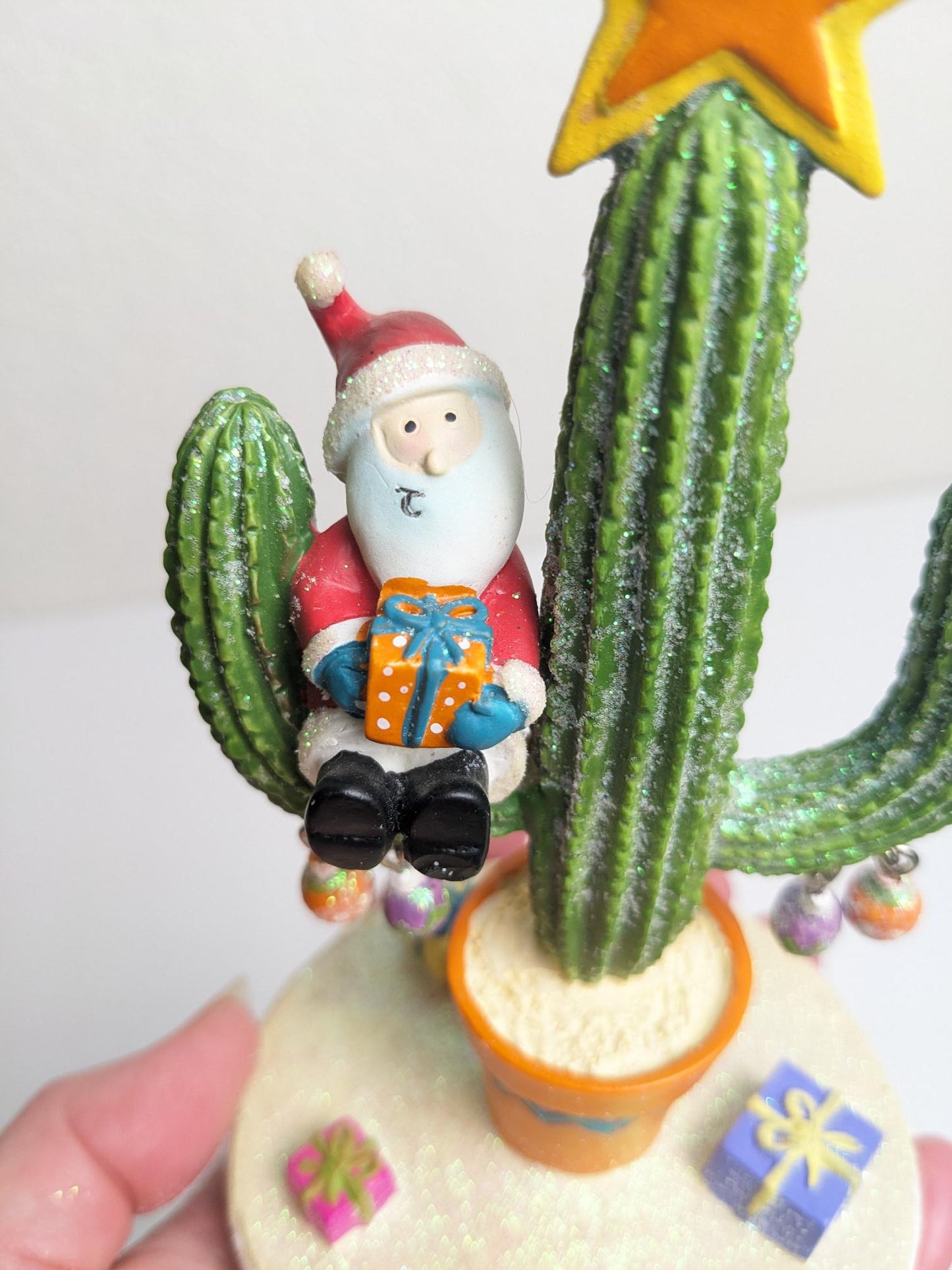 Santa on Cactus Christmas Figurine