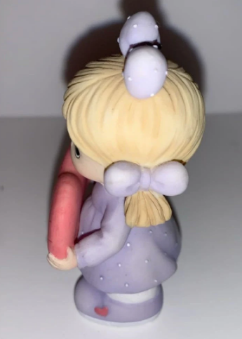 Vintage Precious Moments Girl Holding Heart