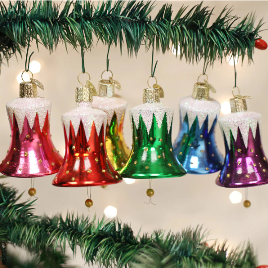 Vintage antique glass Christmas tree bell decoration hanging on a hook Vintage antique glass Christmas tree bell decoration hanging on a hook