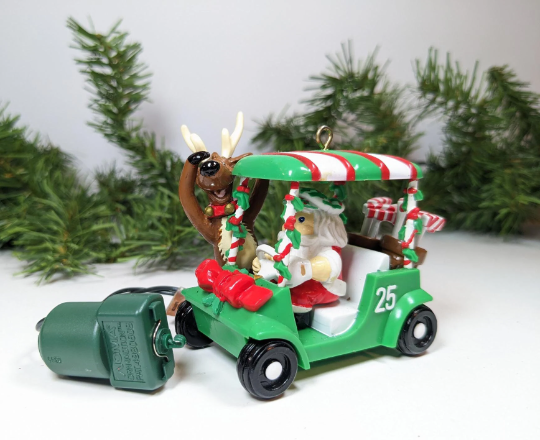 Vintage Rotating Noma 1989 Fore! Golfing Christmas Ornament