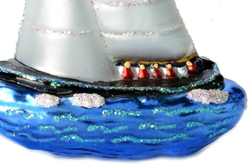 Old World Christmas Blown Glass Ornament of a Sailboat. Notice the cute detail. This is a wonderful nautical gift for the sailor in your life.