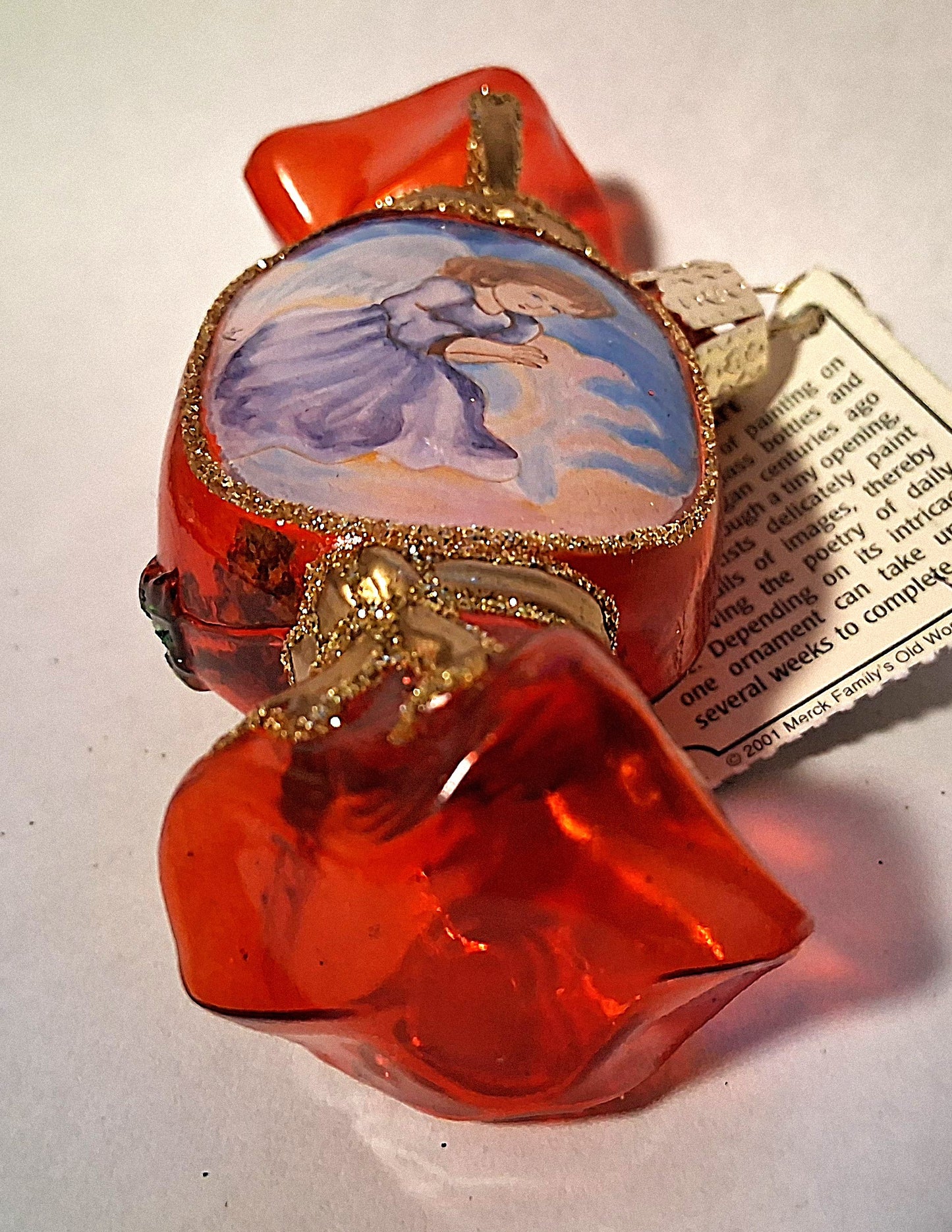 Angel on Tootsie Roll Candy - Inside Art Blown Glass Tree Ornament by Old World Christmas