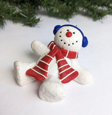 Snow Man Making Snow Angels Christmas Ornament