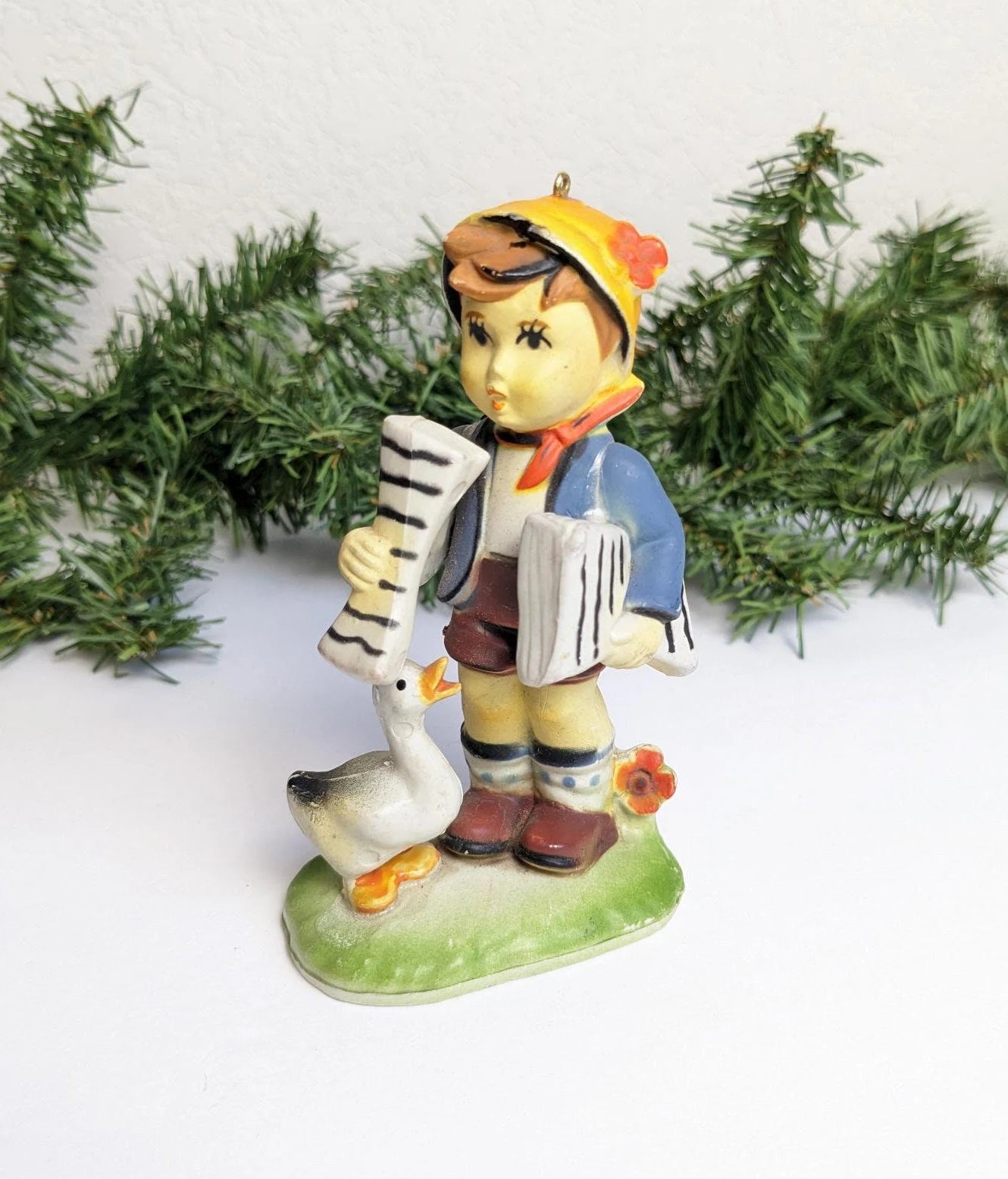 Newspaper Boy with Goose Christmas Ornament