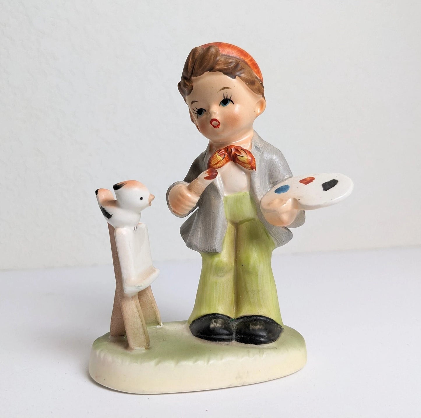 Vintage Napco Painting Boy with Bird Figurine