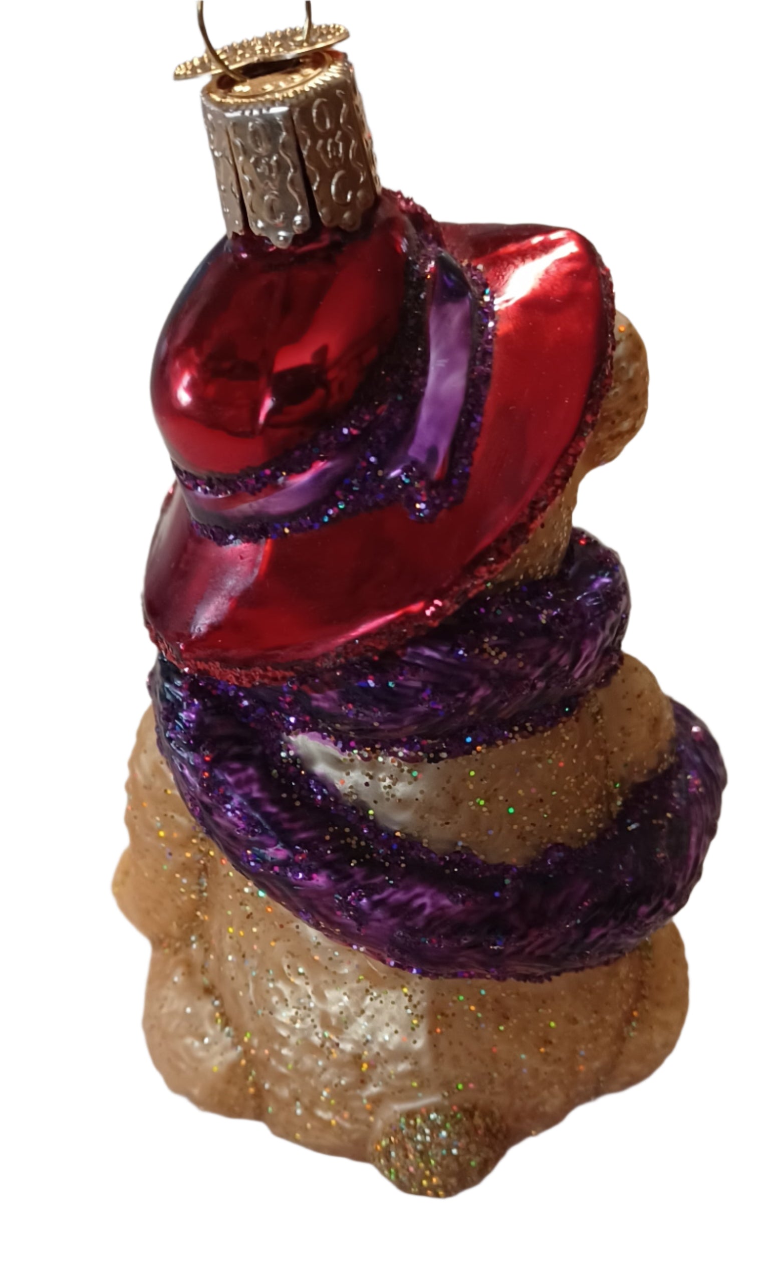 Back view of this adorable ornament with its red hat, purple scarf, and cute little tail. All ornaments by Old World Christmas are mouth blown glass. 