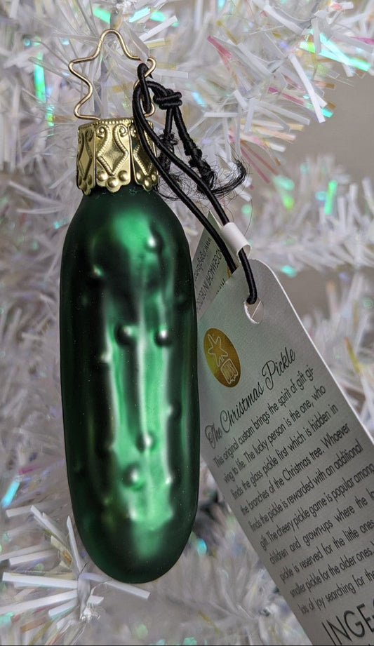 This blown glass tree ornament is in a dark green with gold cap and O hook.