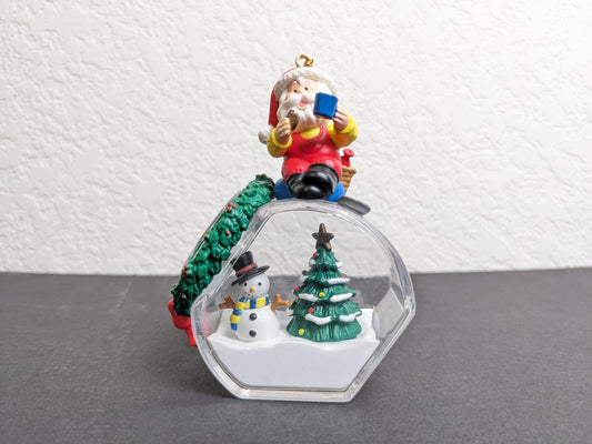 Santa Filling Snow Globe Christmas Ornament