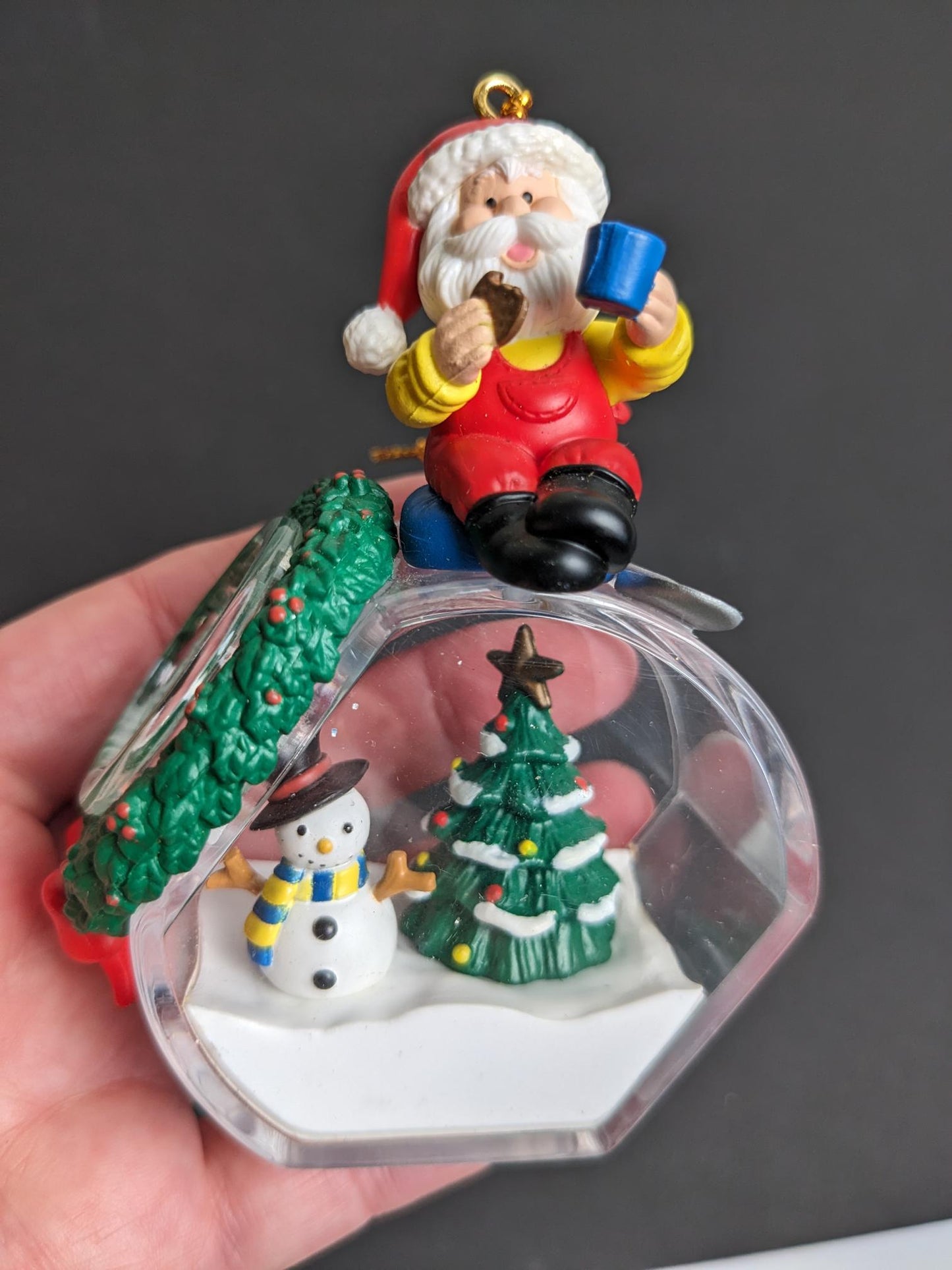 Santa Filling Snow Globe Christmas Ornament