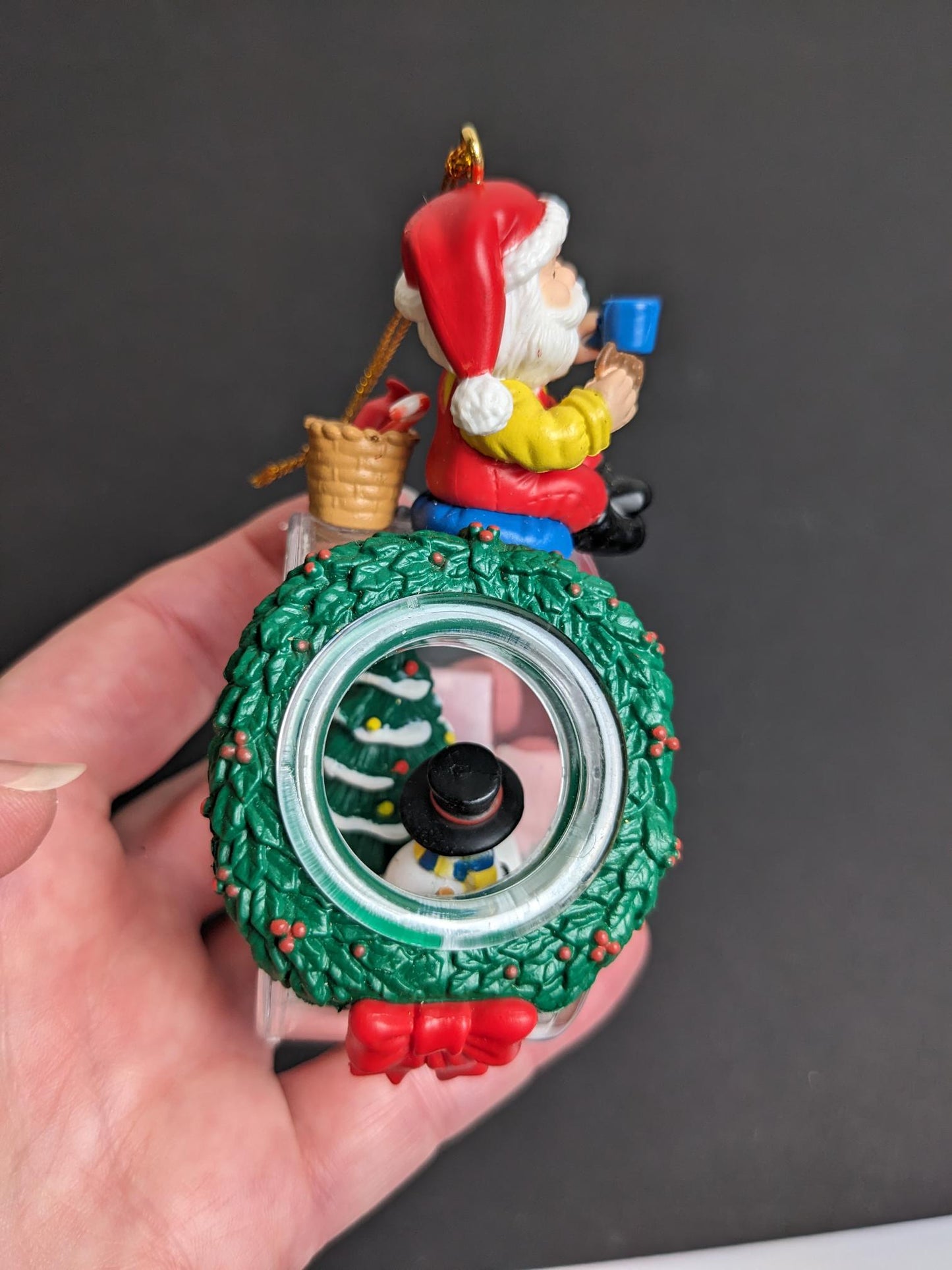 Santa Filling Snow Globe Christmas Ornament