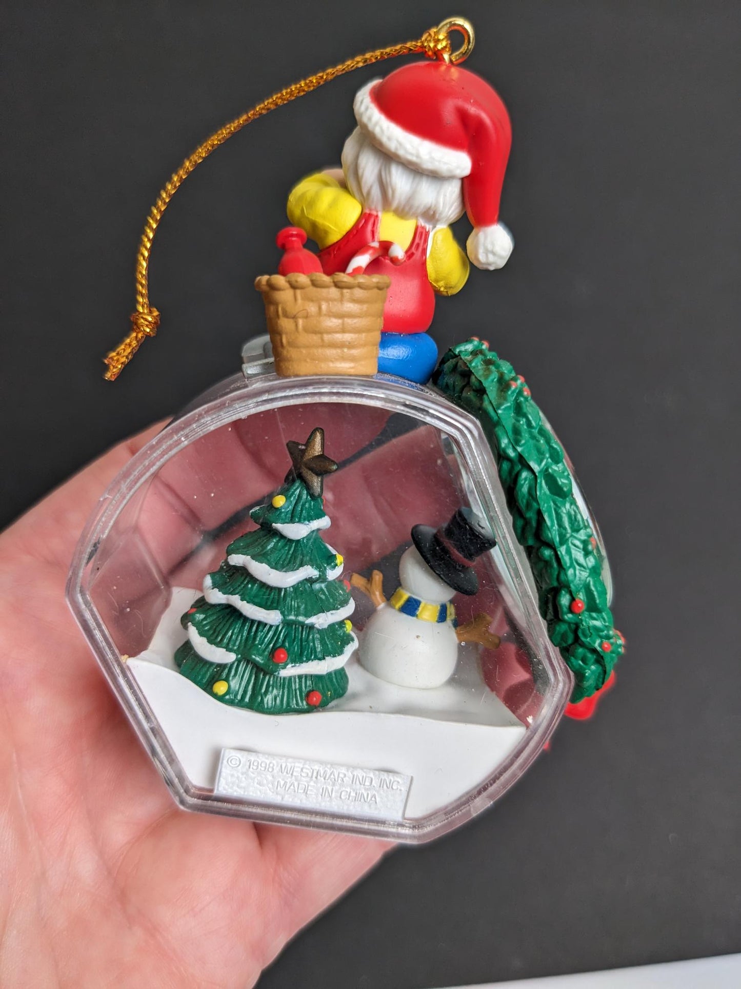 Santa Filling Snow Globe Christmas Ornament