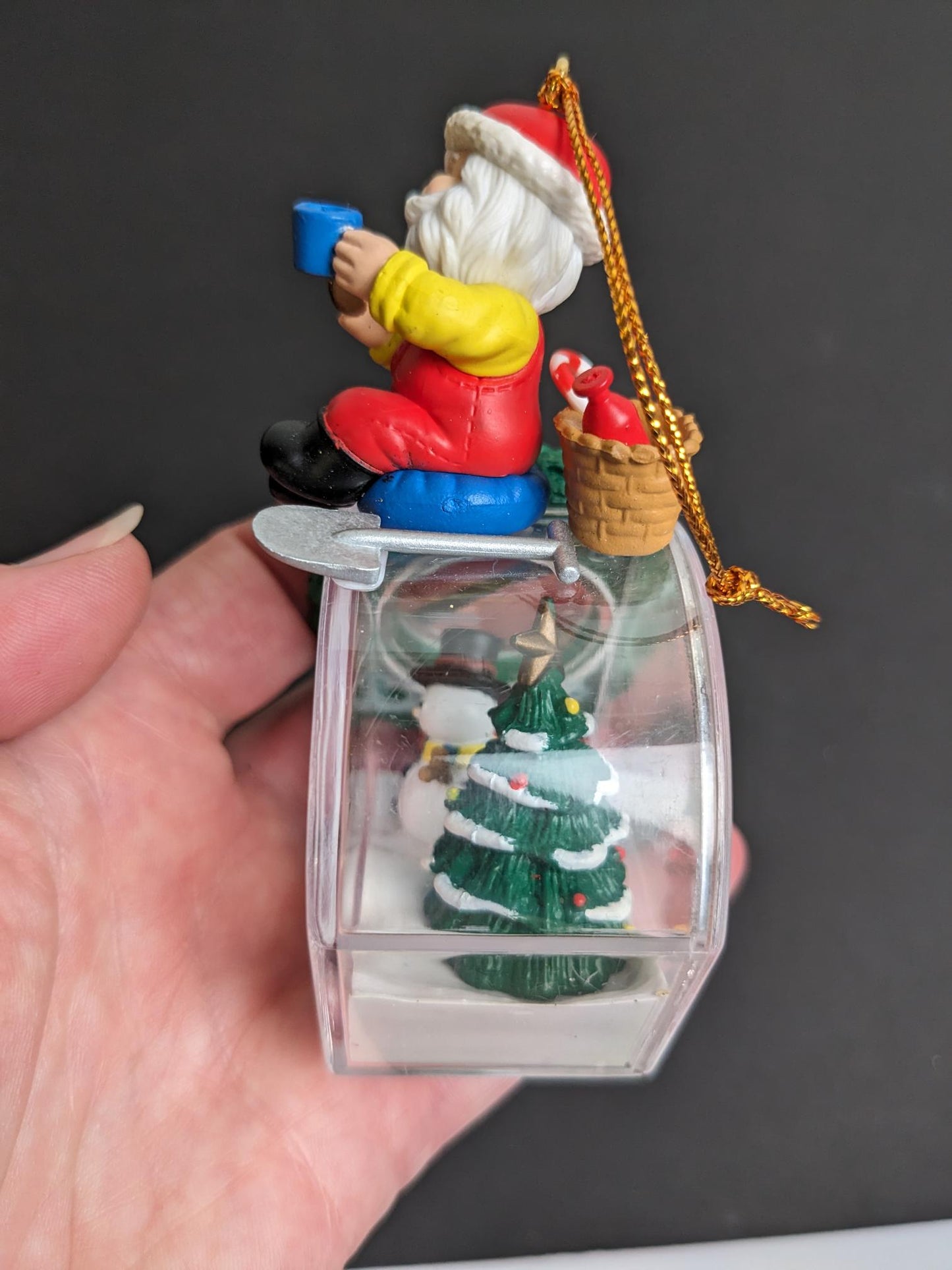 Santa Filling Snow Globe Christmas Ornament