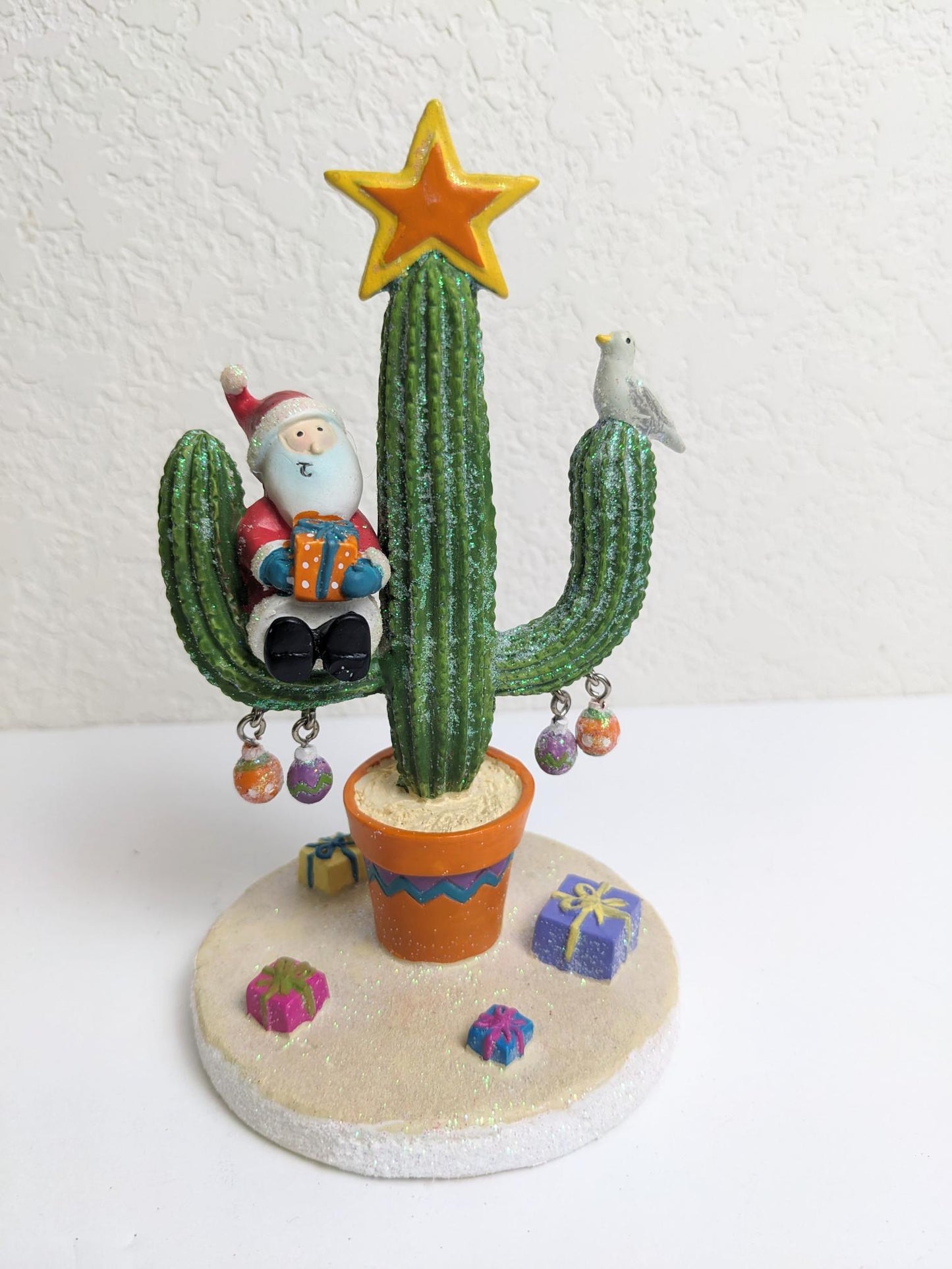 Santa on Cactus Christmas Figurine