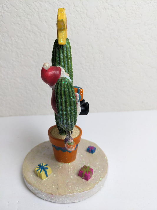 Santa on Cactus Christmas Figurine