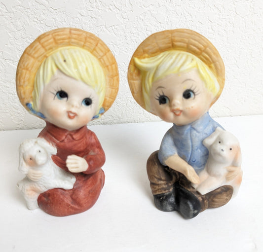 Vintage Boy Holding a Dog and a Girl Holding a Lamb Figurine Set