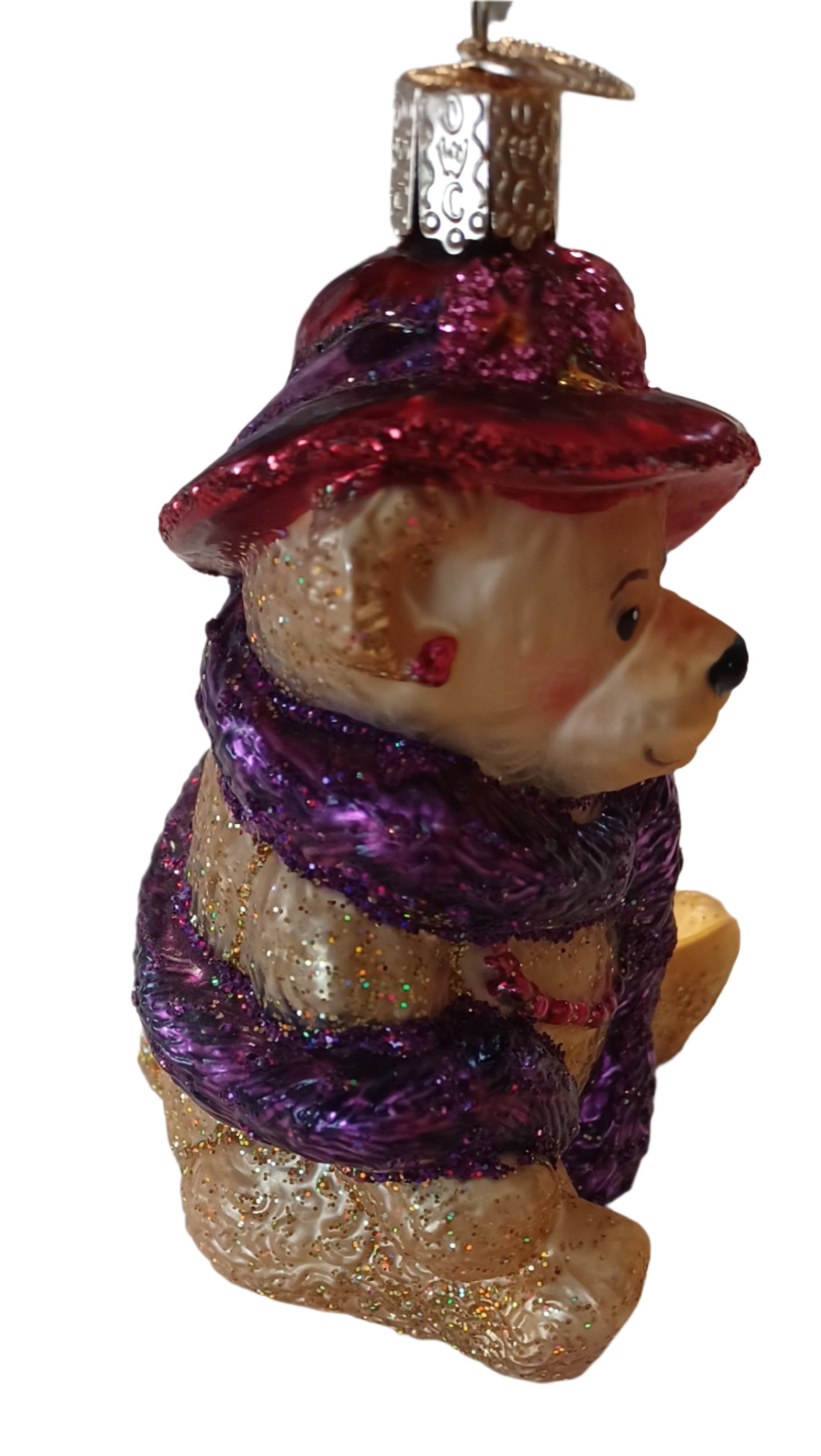 Look at the perky smile and bright eyes of this precious tree ornament. This friendly teddy bear with red and purple will be a cherished gift. 