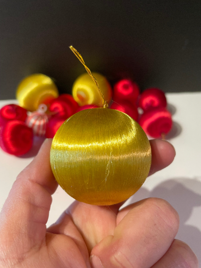Red and Yellow Satin Christmas Ornaments