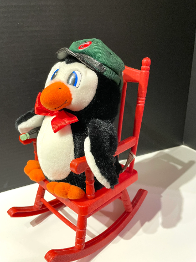 Vintage Coca Cola Penguin in a Rocking Chair