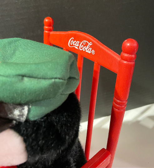 Vintage Coca Cola Penguin in a Rocking Chair