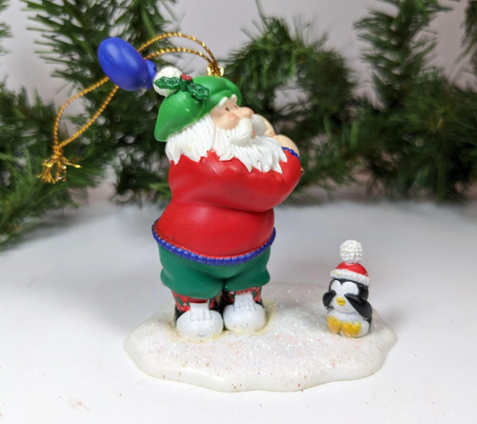 Golfing Santa with Penguin Tee Christmas Ornament