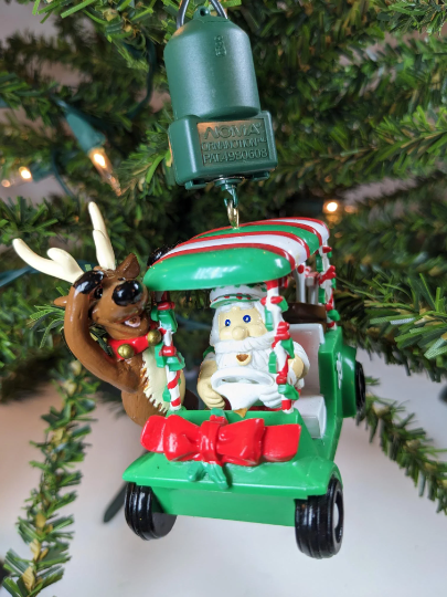 Vintage Rotating Noma 1989 Fore! Golfing Christmas Ornament