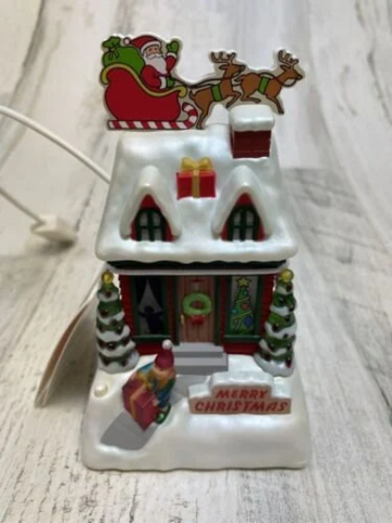 Merry Christmas Caroling Cottage - Hallmark Keepsake 2009
