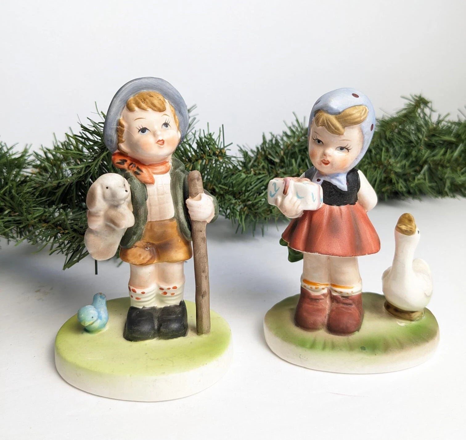 Girl with Goose and Boy with Dog Figurines