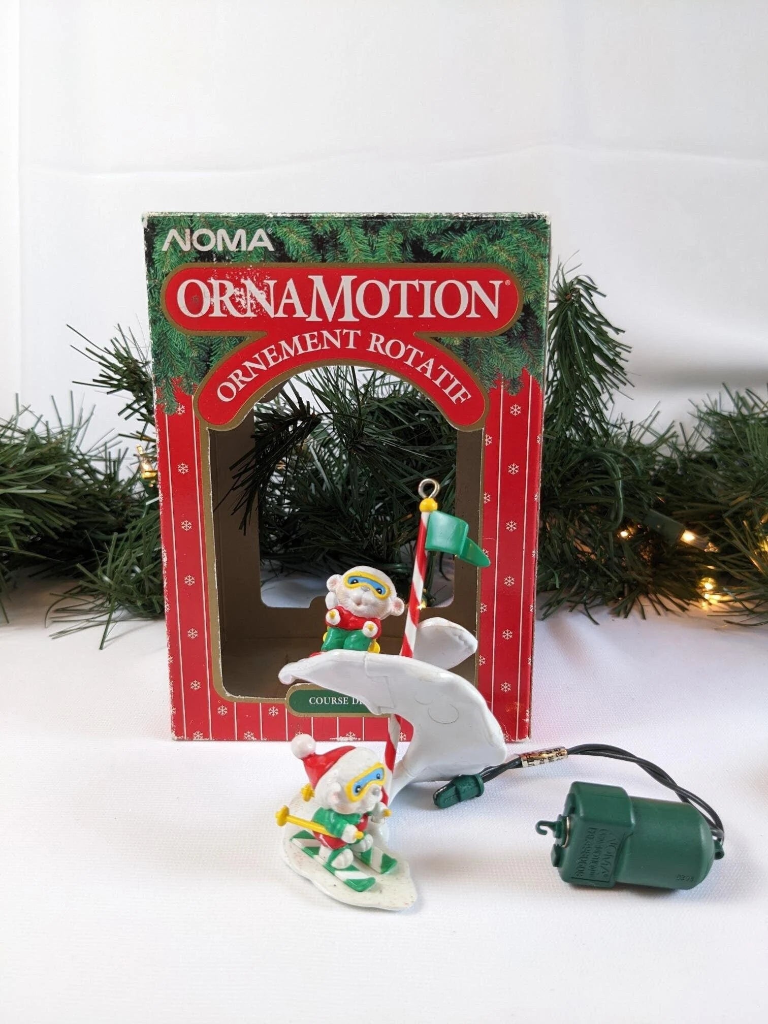 Noma Ornamotion Ski Race Christmas Ornament