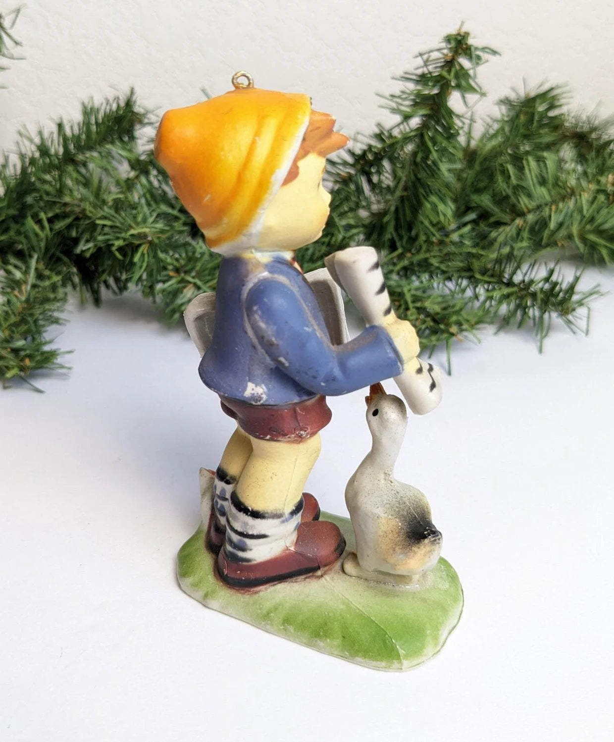 Newspaper Boy with Goose Christmas Ornament