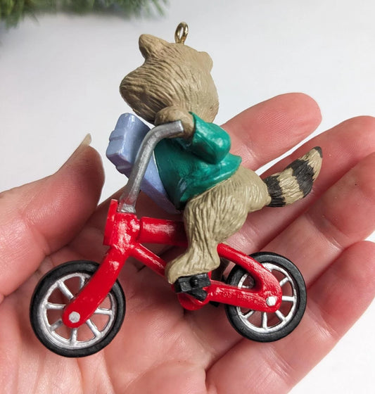 Raccoon Riding a Bike Christmas Ornament