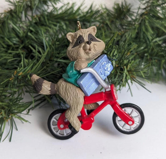 Raccoon Riding a Bike Christmas Ornament