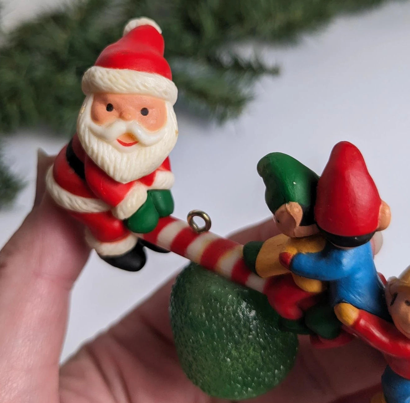 Vintage 1983 Avon Santa's See-Saw Ornament