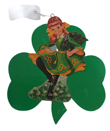 vintage 1960's cardstock image of a young Irish girl in a green and gold dress and gold ribbons in her hair. Background is a die-cut green shamrock. Cardstock image is applied to matching die-cut wood to make for a durable Saint Patrick's day party decoration.