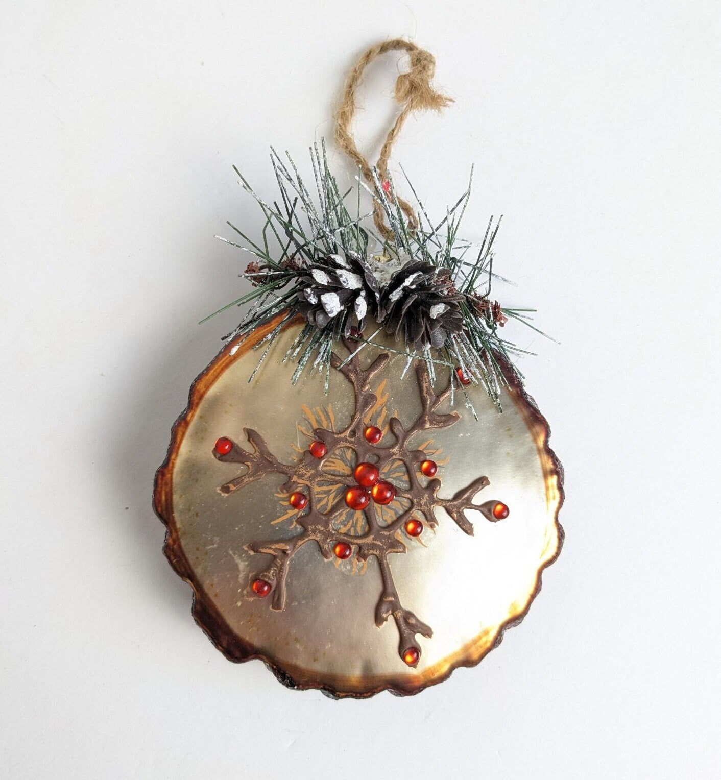 Blown Glass Snowflake on a Tree Stump Ornament