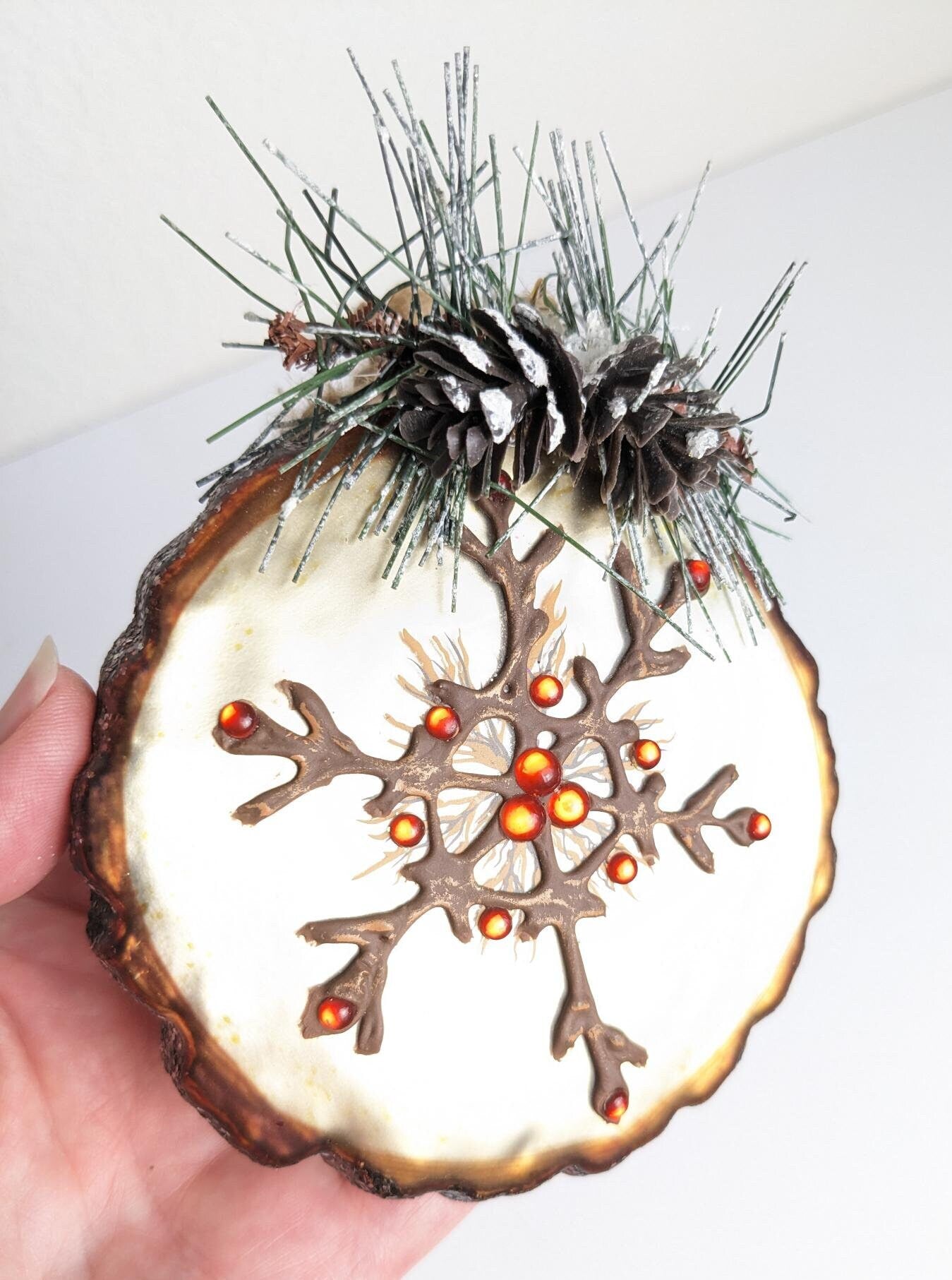 Blown Glass Snowflake on a Tree Stump Ornament