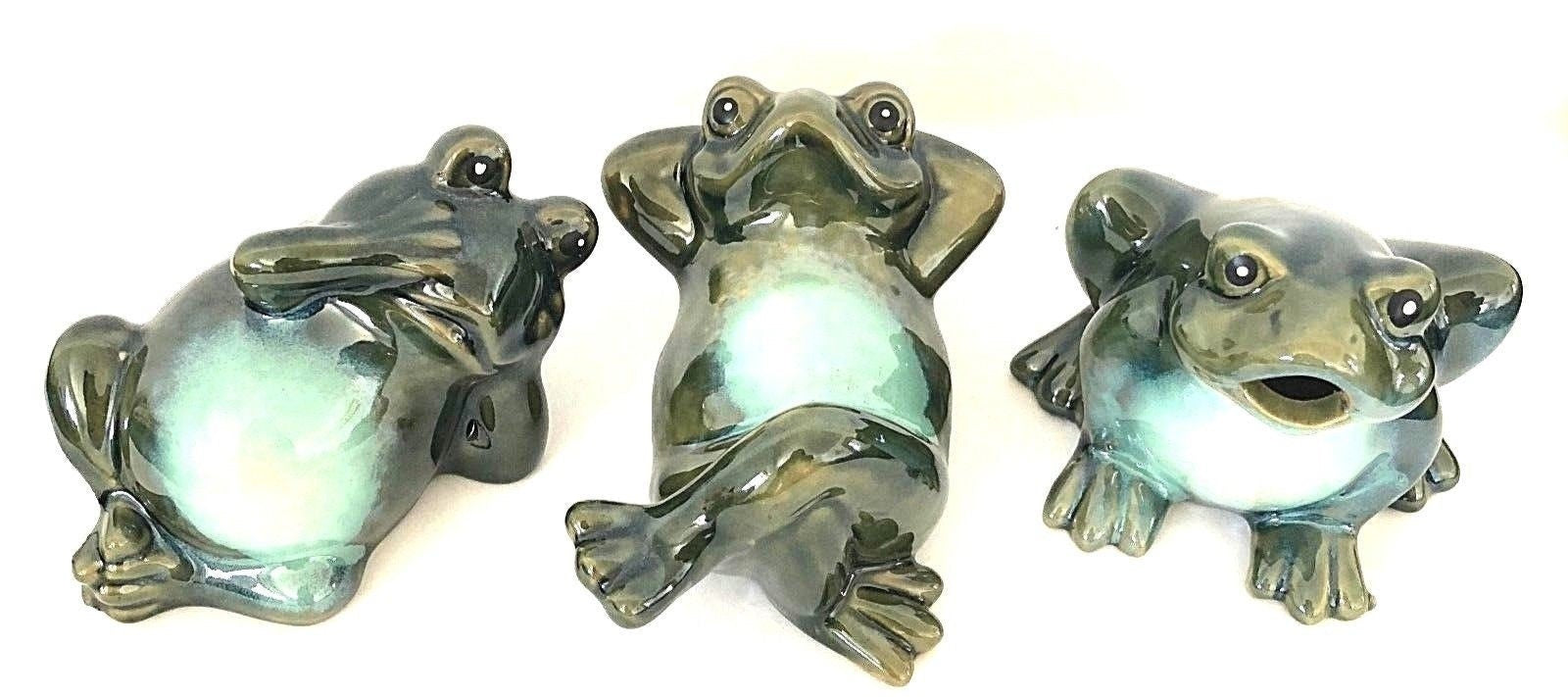 On the left we have the worry wort frog while the middle frog is kicked back in a relaxed position like he doesn't have a care in the world. And the frog on the right could be trying to tell us something. 
